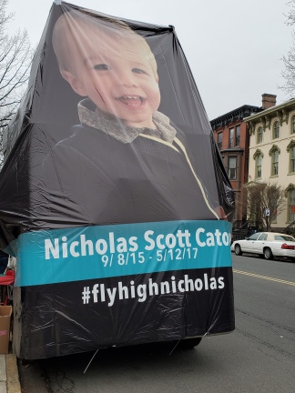 Nicholas Catone, one of many children who passed away from vaccine injury in 2017. His parents attend a rally in Trenton, NJ.
